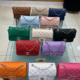 Pallet of 100 handbags for sale at a wholesale price of $1,000.